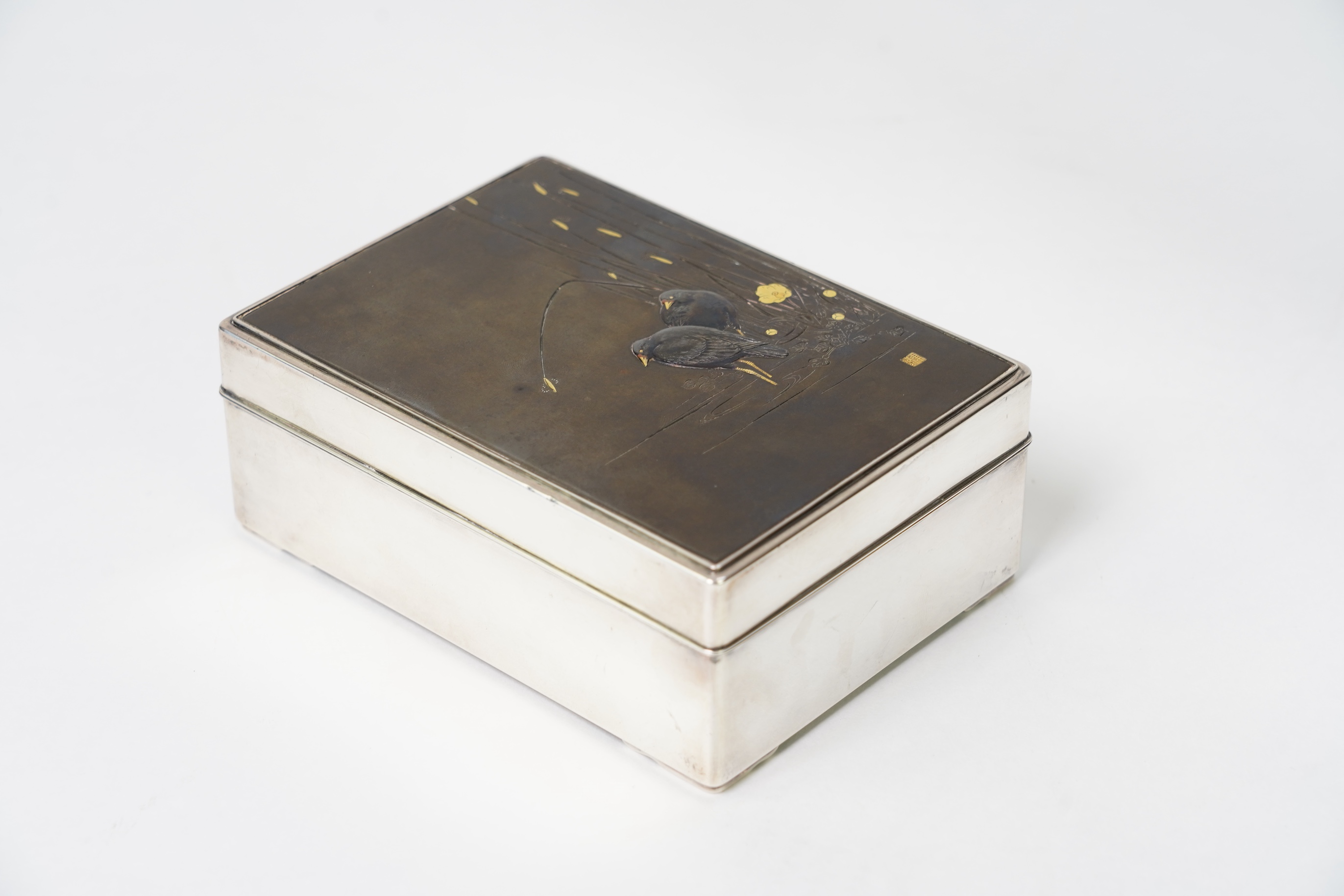 A Japanese shibuichi and shakudo mounted silver box and cover, Taisho period